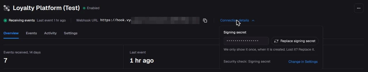 The Connection details panel with the signing secret hidden